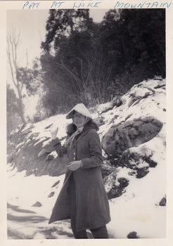 A black and white photograph of a guest who was staying at Mary-Lyn Guest House in Marysville. Mary-Lyn was a part of the Mary Chain of guest houses built by Eric Dowdle in the Depression years. The photograph is of a lady in the snow at Lake Mountain.