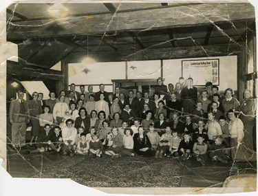 A black and white photograph taken at Mary-Lyn Guest House in Marysville. Mary-Lyn was a part of the Mary Chain of guest houses built by Eric Dowdle in the Depression years. The photograph was taken in September 1955 and is of staff and guests staying at Mary-Lyn at the time.