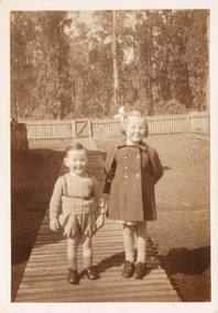 A series of seven black and white photographs of Janet and Robin Hannan who lived in Marysville and had an association with Cooks Mill in Victoria.