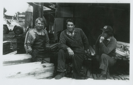 A copy of a black and white photograph of Bill, Allan and Len Sund who at one stage operated the Sunds Bros Sawmill in Marysville. Sund's Sawmill (historically operated by Arthur & John Sund and often referenced locally as Sund Stenco) was a prominent mid-century timber mill located in Marysville, Victoria. It played a central role in the region's booming post-war logging era. 