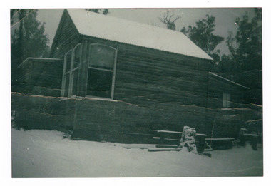 A copy of a black and white photograph of the Wilks Creek State School. The Wilks Creek State School was established, primarily, to educate the timber mill workers' children.