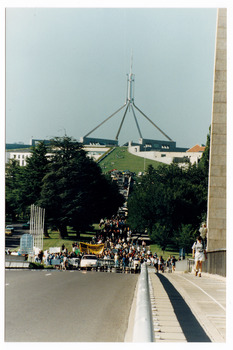 A series of twelve photographs taken in January 1995 of a rally in and to Canberra to make representation on the long term viability of the timber industry, which was seen to be under threat.