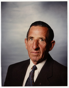 A colour portrait style photograph of Ron Goding who was a long time employee of J.L. Gould Sawmills Pty. Ltd.
