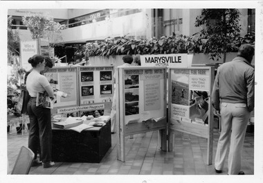 Shows a black and white photograph of the Marysville display at the Victour Holiday and Leisure Show in an unknown year.
