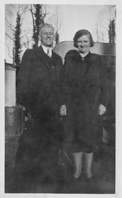 A digital copy of a black and white photograph of members of the Kirwan Family arriving at the Golden Secret mine hut in 1939.