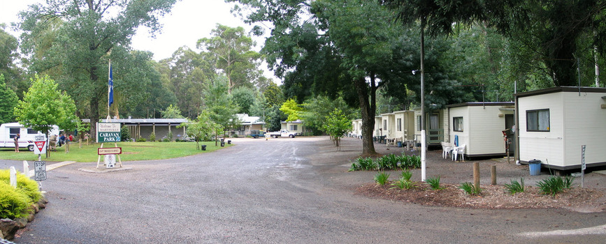 A digital copy of a colour photograph of the entrance to the Marysville Caravan Park.