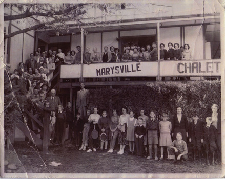 A copy of a black and white photograph of an unknown group of people at The Marysville Chalet.