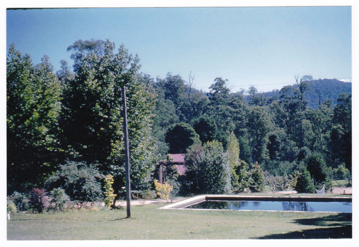 A colour photograph of the swimming pool at Mount Kitchener House taken in April 1960.