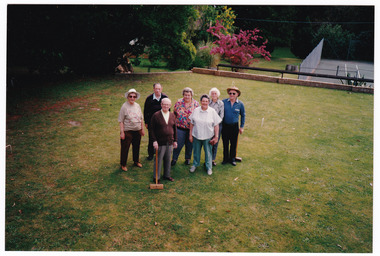 A colour photograph of an unknown group of people playing croquet at Mountain Lodge in Marysville that was taken in October 1993.