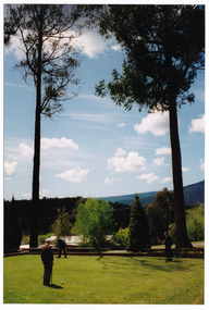 A colour photograph of an unknown group of people playing croquet at Mountain Lodge in Marysville. The photograph was taken in October, 1993.