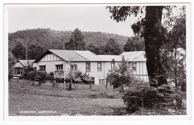 A black and white postcard of Roseleigh Guest House in Marysville that was produced by Valentine Publishing Co. Pty Ltd as a souvenir of Marysville.