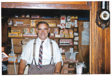 A colour photograph taken at Mary-Lyn Guest House in Marysville. Mary-Lyn was a part of the Mary Chain of guest houses built by Eric Dowdle during the Depression years. The photograph is of Mr. Fred Fiske, the proprietor of Mary-Lyn at the time and was taken in January 1962.