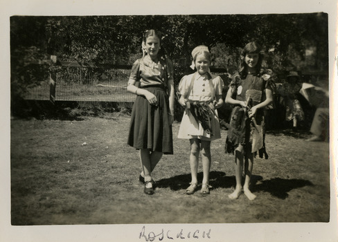 A black and white photograph of three unknown children wearing dress ups at Roseleigh in Marysville. The photograph was taken in 1954.