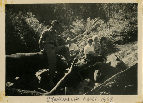 A black and white photograph of an unknown group of people at Steavenson Falls in Marysville. The photograph was taken in 1954 during a stay at Roseleigh in Marysville.