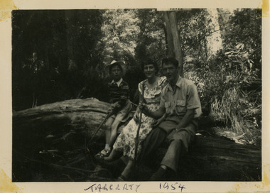 A black and white photograph of an unknown boy, woman and man in Taggerty. The photograph was taken in 1954 during a stay at Roseleigh in Marysville.