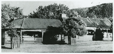 A black and white photograph of The Falls guest house in Marysville.