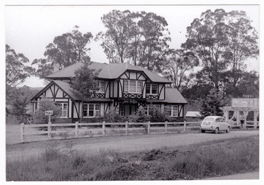 A black and white photograph of Tudor Lodge Cafe in Narbethong in Victoria.