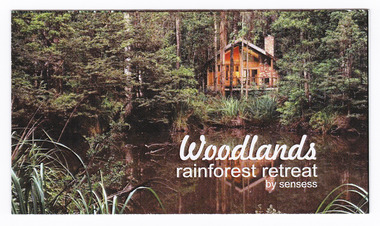 A business card regarding Woodlands Rainforest Retreat in Narbethong.