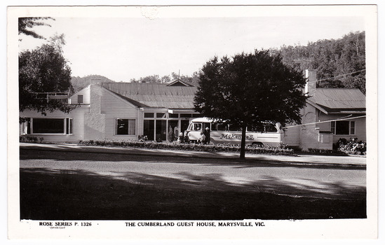 A black and white postcard of The Cumberland Guest House in Marysville. The postcard was produced by the Rose Stereograph Co. as a souvenir of Marysville. On the reverse of the postcard is a space to write a message and an address and place a postage stamp. The postcard is unused.