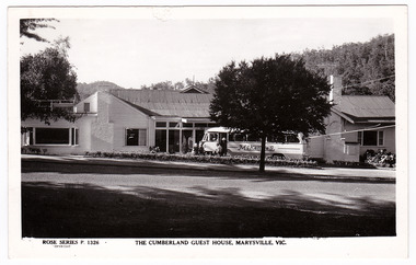 A black and white postcard of The Cumberland Guest House in Marysville. The postcard was produced by the Rose Stereograph Co. as a souvenir of Marysville. On the reverse of the postcard is a space to write a message and an address and place a postage stamp. The postcard is unused.