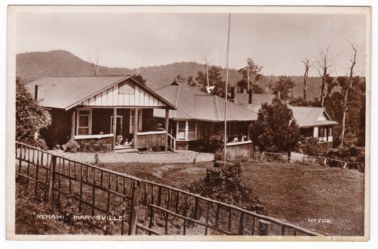 A black and white postcard from Kerami Guest House in Marysville. The original Kerami Guesthouse was built in 1907. On the reverse of the postcard is a space to write a message and an address and to place a postage stamp. The postcard is unused.