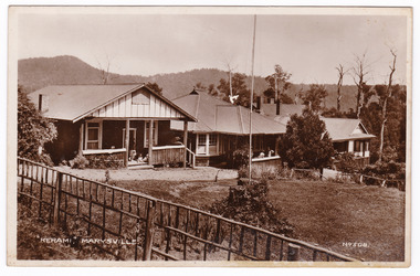 A black and white postcard from Kerami Guest House in Marysville. The original Kerami Guesthouse was built in 1907. On the reverse of the postcard is a space to write a message and an address and to place a postage stamp. The postcard is unused.
