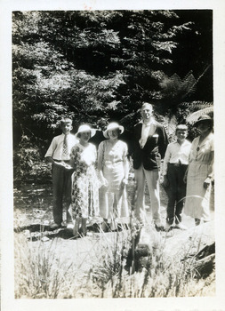 A digital copy of a black and white photograph of a Doctor Harrison and his family taken at Kerami guest house in Marysville.