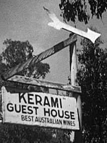 A digital copy of a black and white photograph of the outside sign at Kerami Guest House in Marysville. The original photograph was taken in 1920.