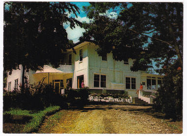 A colour postcard from Kerami Guest House in Marysville. The postcard was produced by Murfett Publishers as a souvenir of Marysville. On the reverse of the postcard is a space to write a message and an address and to place a postage stamp. The postcard is unused.