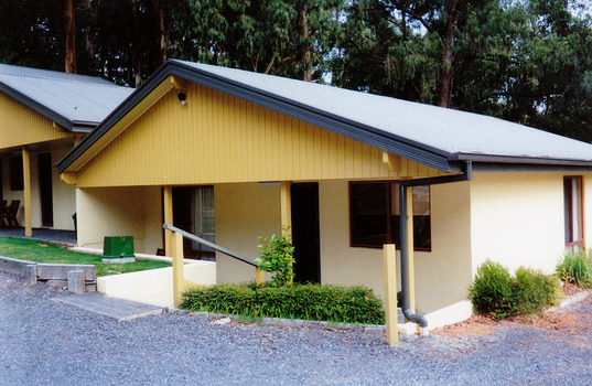 A digital copy of a colour photograph of the one of the accommodation buildings at Kerami Gardens Resort in Marysville. The original photograph was taken in 2008.