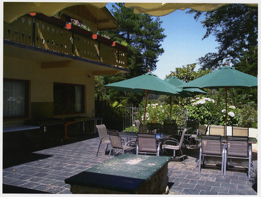 A colour photograph taken at Kerami Gardens Resort in Marysville. The photograph is of the outdoor dining area.