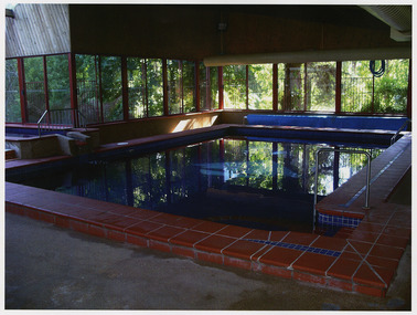 A colour photograph taken at Kerami Gardens Resort in Marysville. The photograph is of the indoor swimming pool area.
