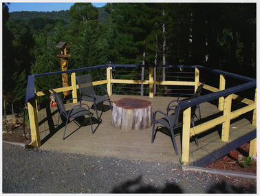 A colour photograph taken at Kerami Gardens Resort in Marysville. The photograph is of an outdoor seating area.