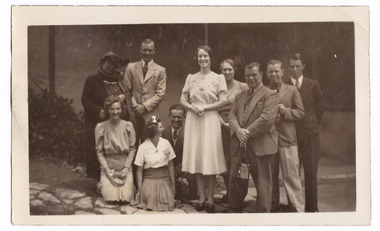 A black and white photograph taken at Mary Lodge Guest House in Marysville. The photograph is of an unknown group of people. The photograph was taken in 1941.