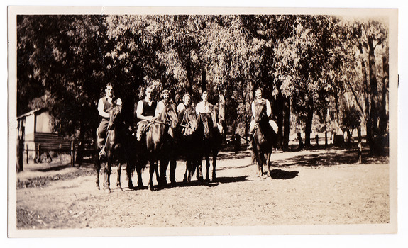 A black and white photograph of a group of guests staying at Mary Lodge Guest House in Marysville. The photograph shows them horse riding. The photograph was taken in 1941.