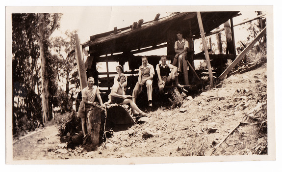A black and white photograph of a group of guests staying at Mary Lodge Guest House in Marysville. The photograph shows them visiting a local sawmill. The photograph was taken in 1941.