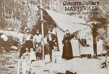 A digital copy of a black and white photograph of the Chester Family who were living at the Golden Secret Mine in the Cumberland Valley. The original photograph was taken in 1906.