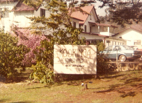 A copy of a colour photograph of the front entrance sign to Kooringa Tourist House in Marysville.
