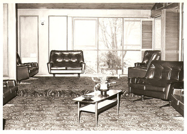 A copy of a black and white photograph taken at Kooringa Tourist House in Marysville. The photograph is of a guest lounge area.