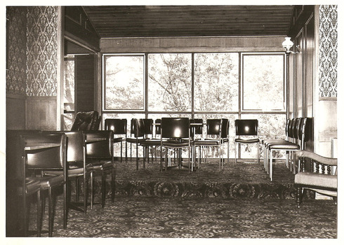 A copy of a black and white photograph taken at Kooringa Tourist House in Marysville. The photograph is of the guest dining area.