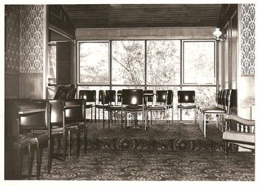 A copy of a black and white photograph taken at Kooringa Tourist House in Marysville. The photograph is of the guest dining area.