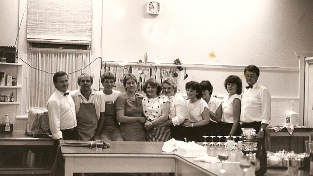 A copy of a black and white photograph taken at Kooringa Tourist House in Marysville. The photograph is of the service staff at Kooringa.