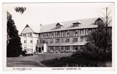 A black and white postcard of Marybrooke guest house in Sherbrooke. Marybrooke was part of the Mary Chain of guest houses built by Eric Dowdle during the Depression years. The postcard was produced by the Rose Stereograph Company as a souvenir of Sherbrooke.