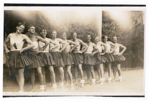 A copy of a black and white photograph taken at Mary-Lyn Guest House in Marysville. Mary Lyn was a part of the Mary Chain of guest houses built by Eric Dowdle in the Depression years. The original photograph was taken in January 1940 and shows a group of ten men dressed as ballerinas. The group called themselves 'Ten Pretty Girls' which was also a song that they danced to.view of a group of riders on horseback.