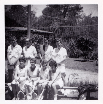 A black and white photograph that was taken at Mary-Lyn Guest House in Marysville. Mary-Lyn was a part of the Mary Chain of guest houses built by Eric Dowdle in the Depression years. The photograph is of a group of tennis players at Mary-Lyn.