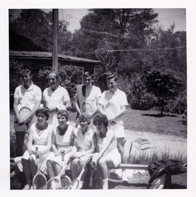 A black and white photograph that was taken at Mary-Lyn Guest House in Marysville. Mary-Lyn was a part of the Mary Chain of guest houses built by Eric Dowdle in the Depression years. The photograph is of a group of tennis players at Mary-Lyn.