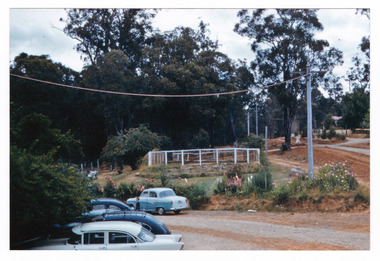 A copy of a colour photograph taken at Mary-Lyn Guest House in Marysville. Mary-Lyn was a part of the Mary Chain of guest houses built by Eric Dowdle in the Depression years. The photograph was taken in January 1962 and shows a view of the swimming pool at Mary-Lyn.