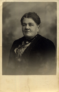 A copy of a black and white photograph of Sarah Lawlor of Buxton. William and Sarah Lawlor were pioneers in Buxton and farmed there from 1904 for approximately 20 years.