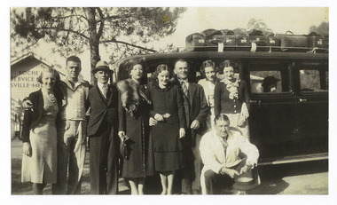 A copy of a black and white photograph of a group of couples all on a visit to Marysville for their honeymoons. The original photograph was taken in April 1938 and was the chance first meeting of the honeymooners which blossomed into life-long friendships amongst the couples.