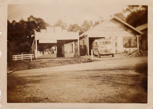 A black and white photograph of the McKenzie's bus office and depot in Marysville. McKenzie's Tourist Services were associated with the growth of Marysville as a tourist destination.